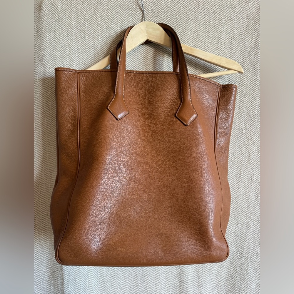Hermes Tan Leather Tote Bag
Approx 16.5” high X 6”deep X 13” wide 6” strap drop - Picture 5 of 10